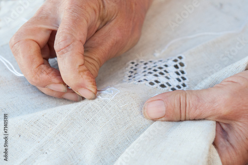 Senior Woman knitting photo