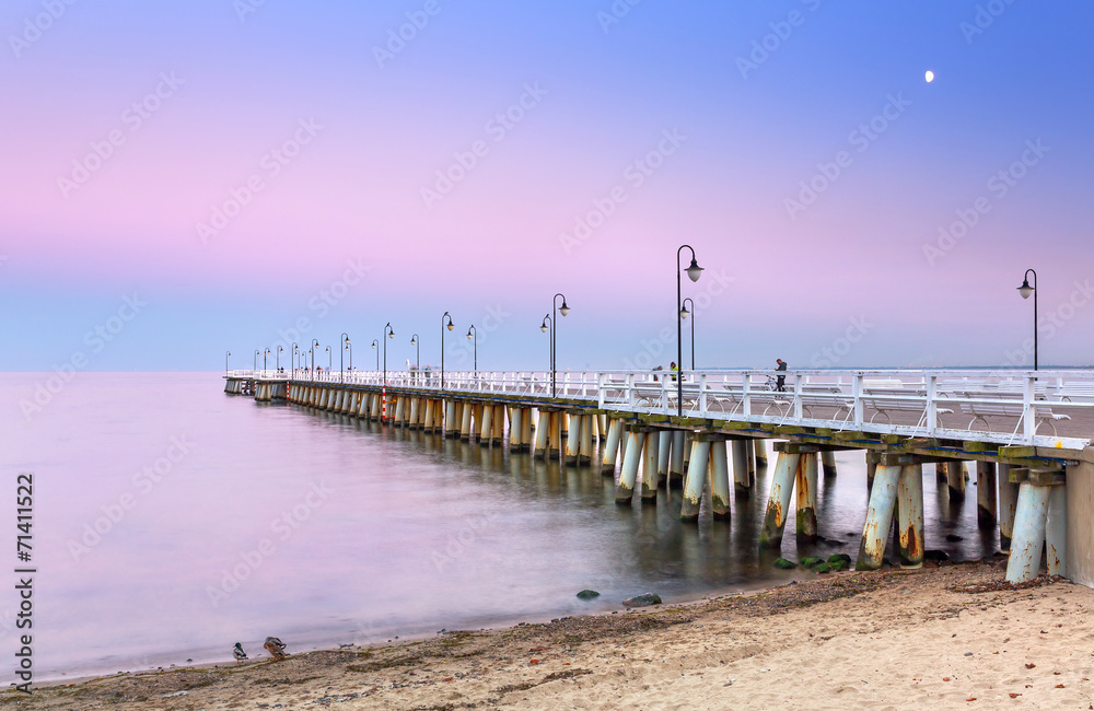 Fototapeta premium Baltic pier in Gdynia Orlowo at sunset, Poland