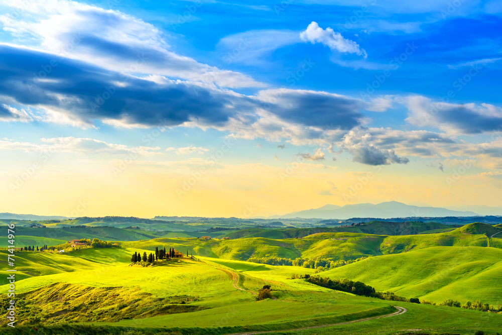 Fototapeta premium Tuscany, rural sunset landscape. Countryside farm, white road an