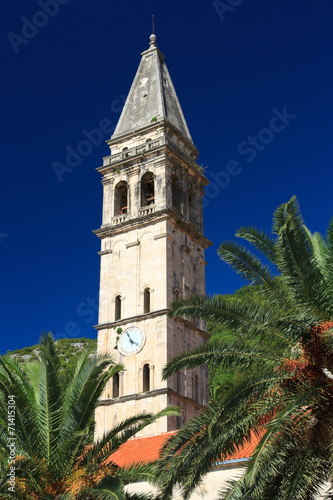 old church with a bell tower in Perast, Montenegro