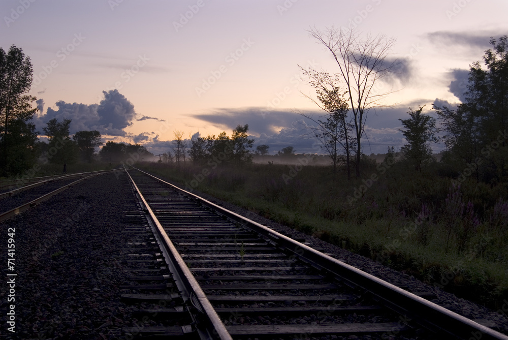 Fototapeta premium Railroad Tracks with Sunset