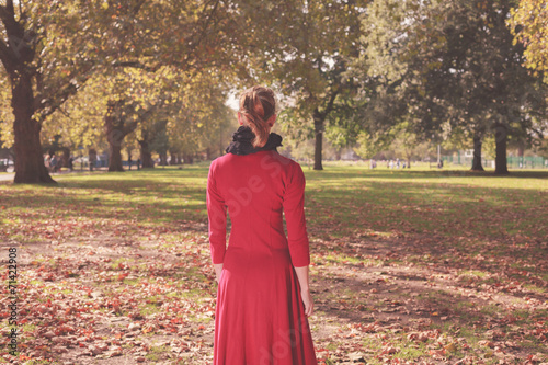 Young woman walking in the park