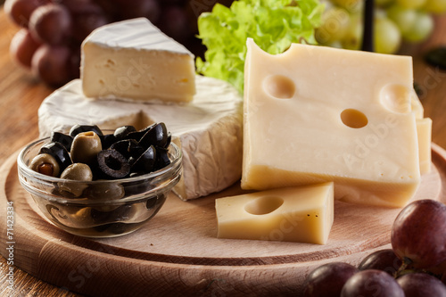 Cheese, olive and grapes