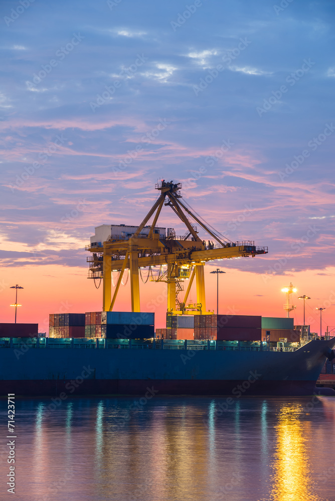 Industrial Container Cargo freight ship with working at twilight