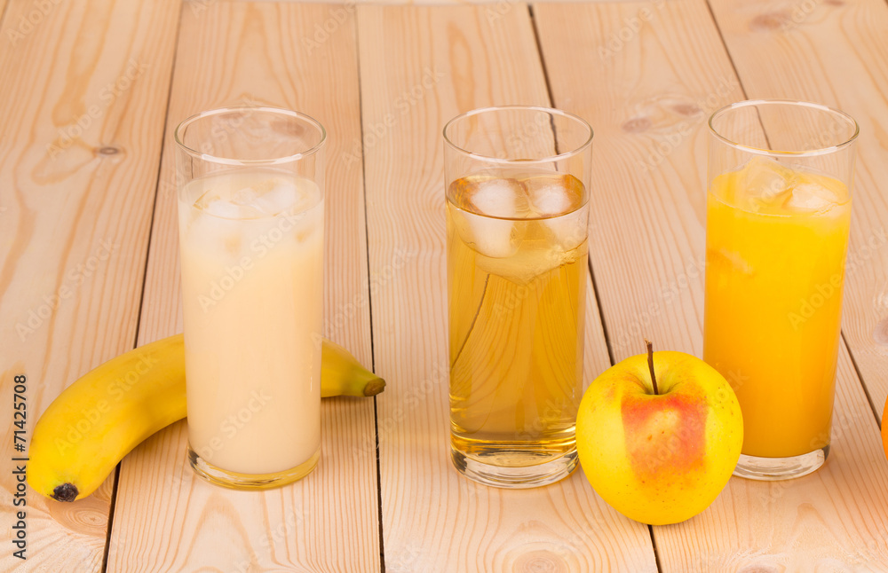 Tasty various juices on wood table. Tasty various juices on wood table.