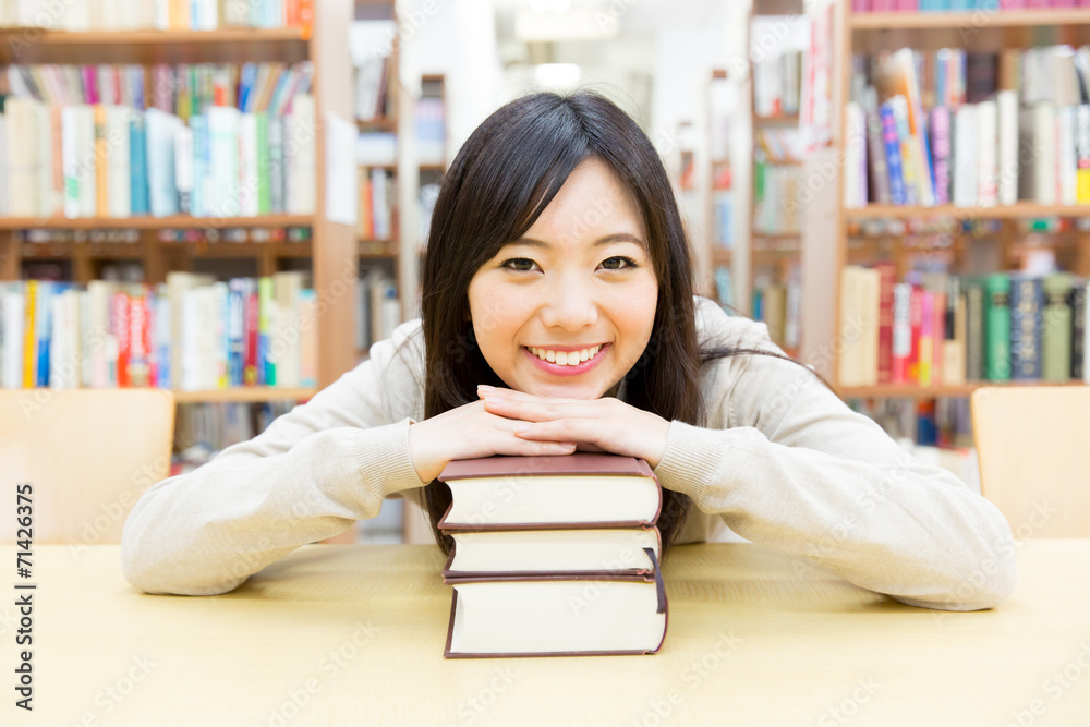 young asian student in the library young asian student in the library