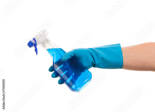 Blue spray in hand on white background