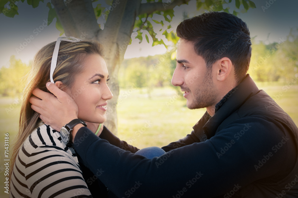 Young couple in love looking in each other’s eyes Young couple in love looking in each other’s eyes