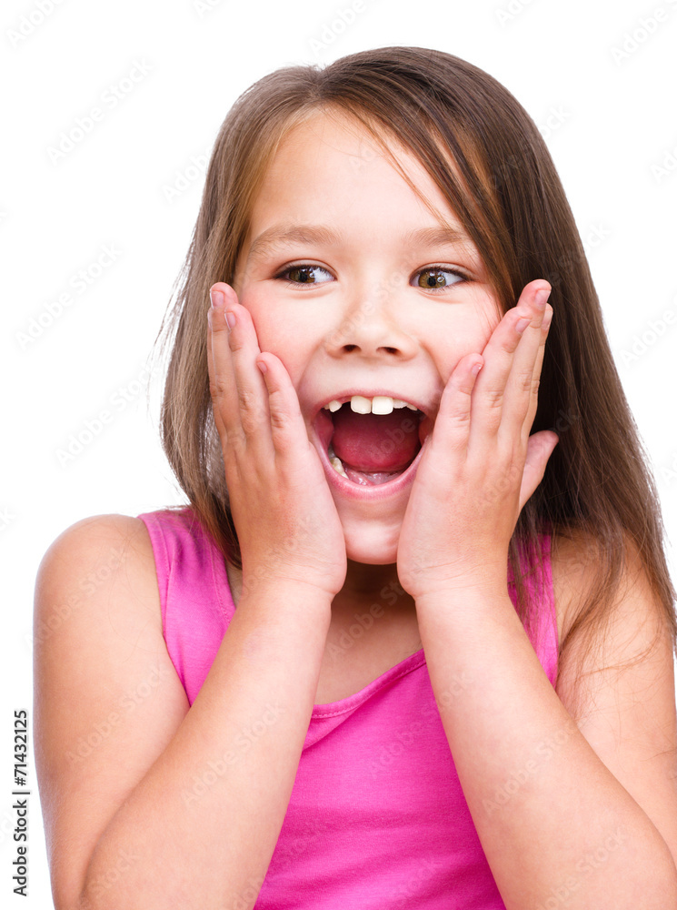 Cute girl is holding her face in astonishment Cute girl is holding her face in astonishment