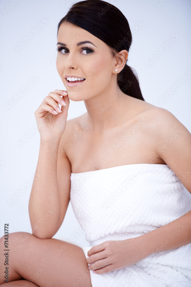 Pretty Woman Wrapped in White Towel on Body