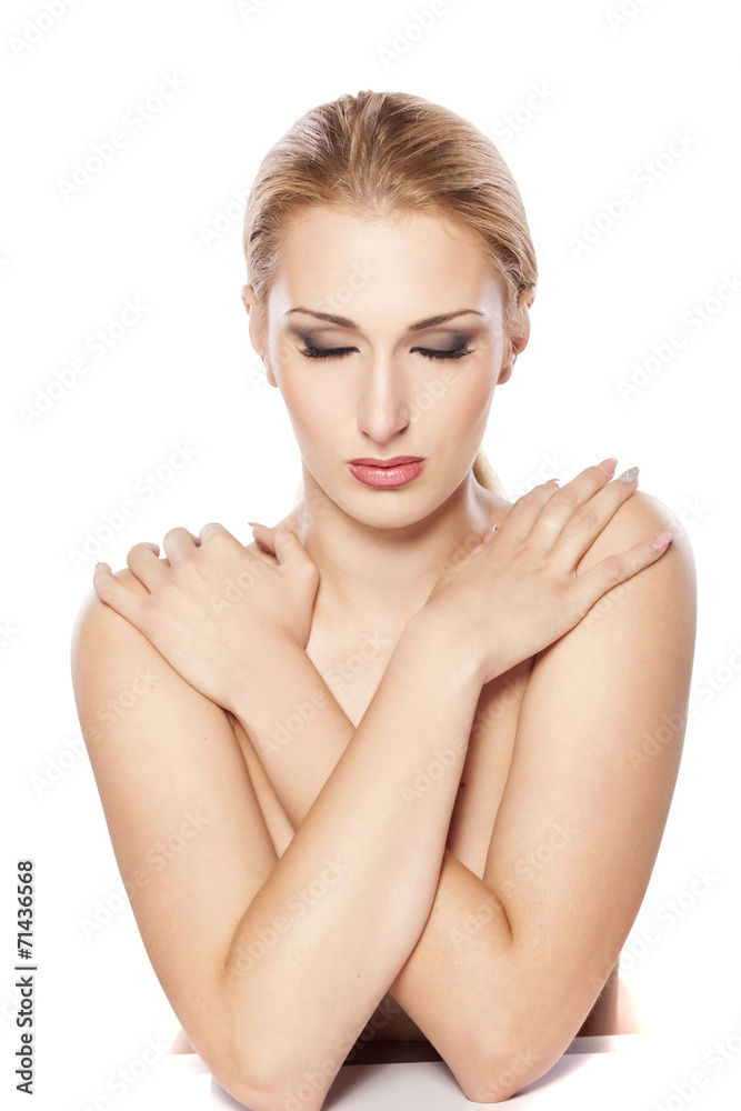 beautiful blonde with makeup posing on white background beautiful blonde with makeup posing on white background