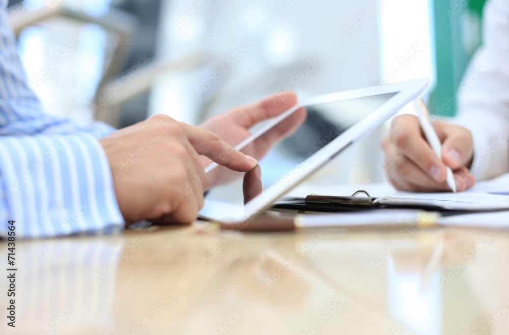 Business adviser analyzing financial figures Business adviser analyzing financial figures