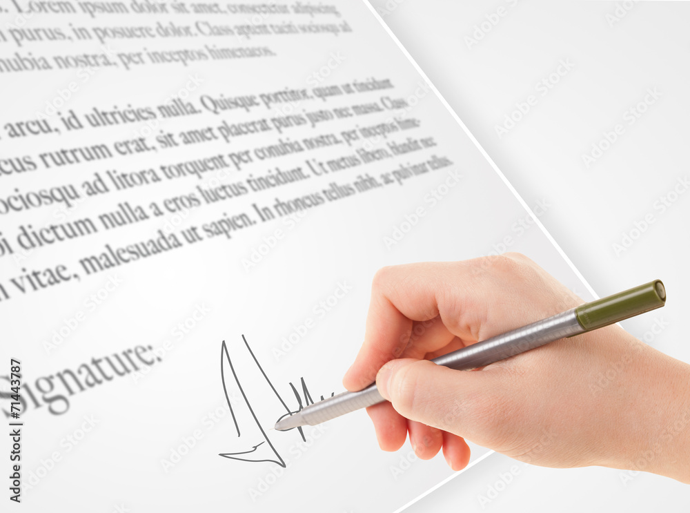 Hand writing personal signature on a paper form Hand writing personal signature on a paper form