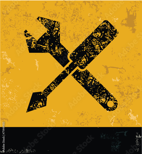 Repair symbol on grunge yellow background,grunge vector