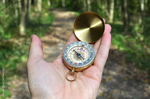 Compass in the hand photo