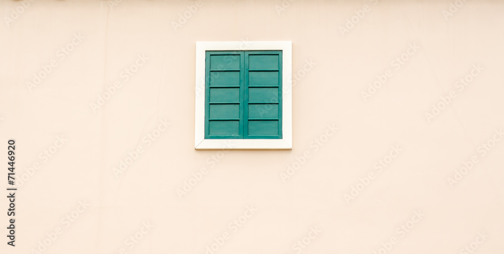 The wooden window close on the wall
