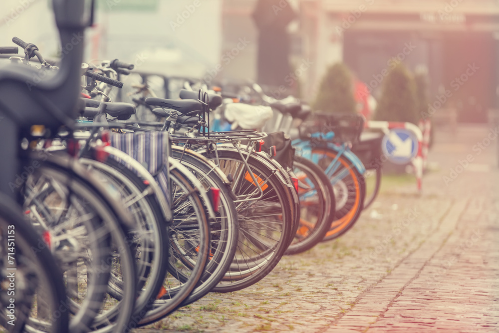 Group of bikes in parking in Amsterdam