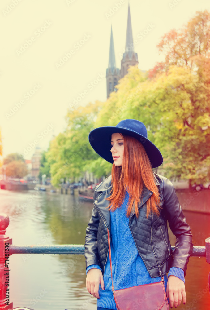 Redhead in hat girl in Amsterdam.