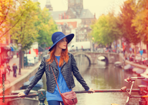 Redhead in hat girl in Amsterdam.