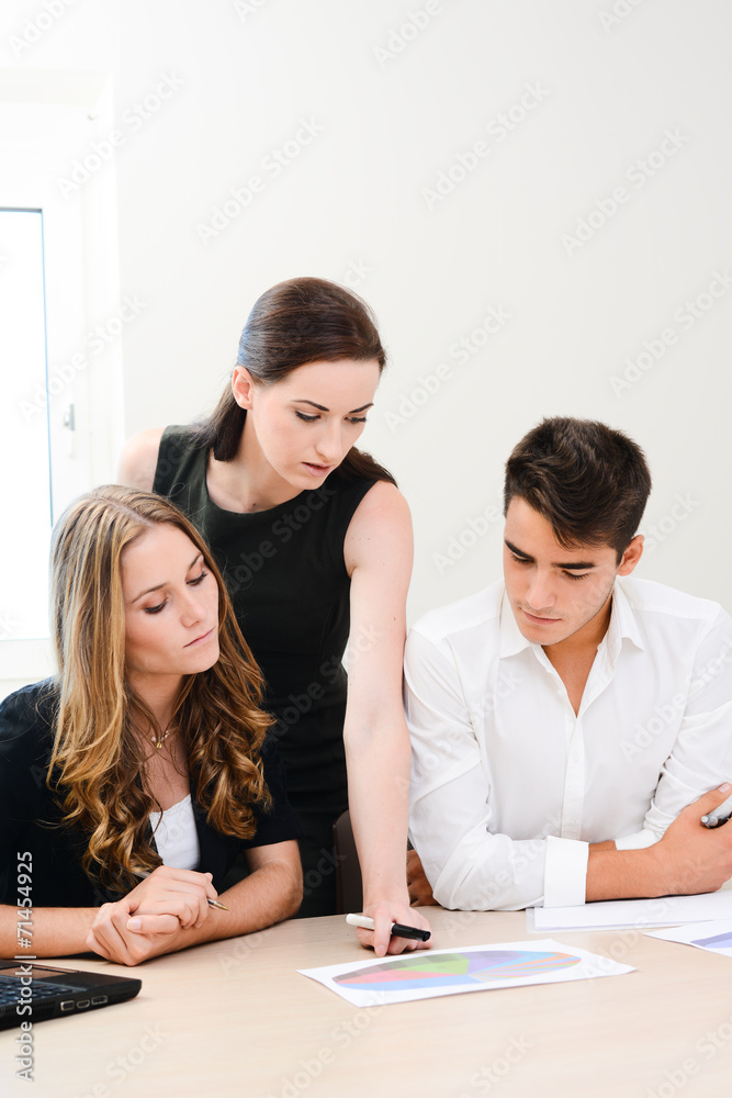 young people business team working together in a meeting room young people business team working together in a meeting room