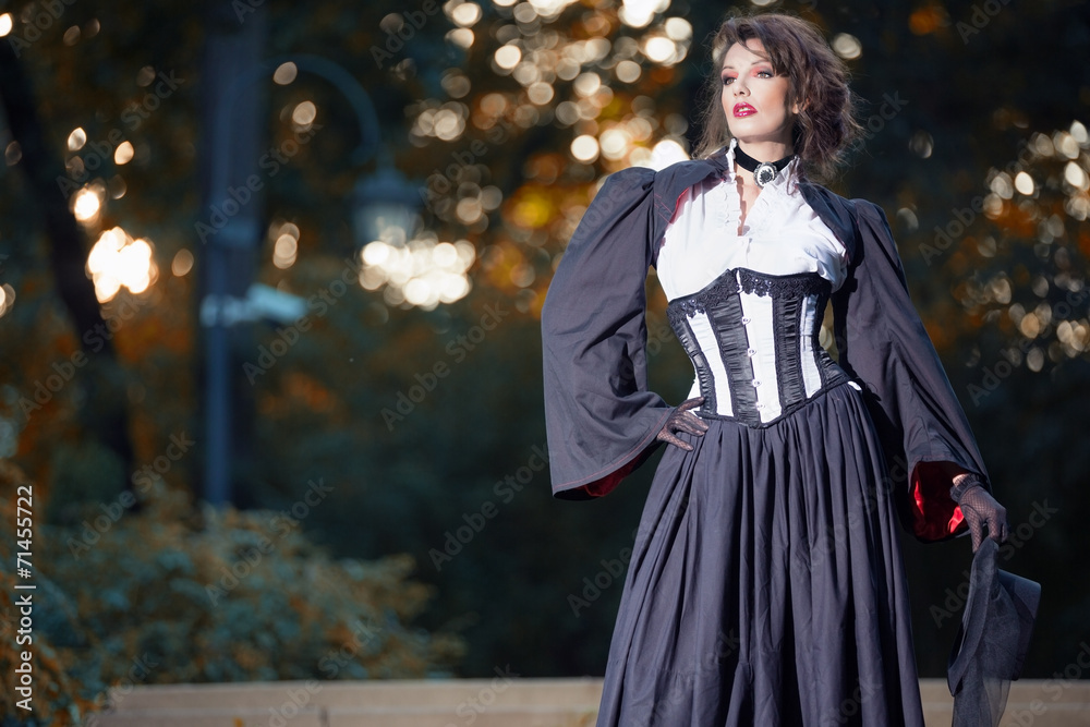 Mysterious woman in Victorian dress