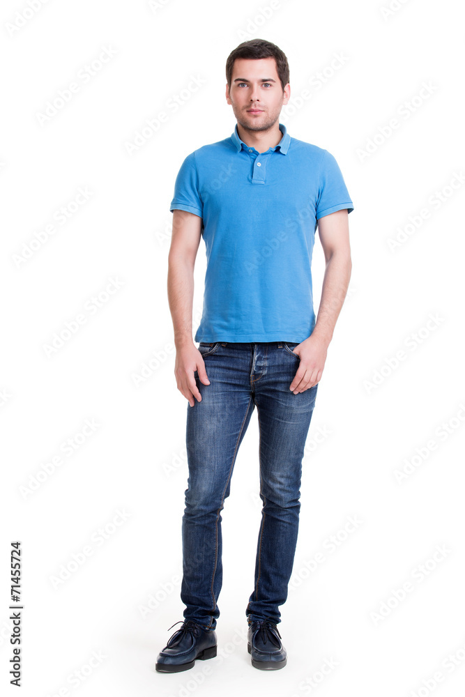 Full portrait of smiling happy handsome man in blue t-shirt. Full portrait of smiling happy handsome man in blue t-shirt.