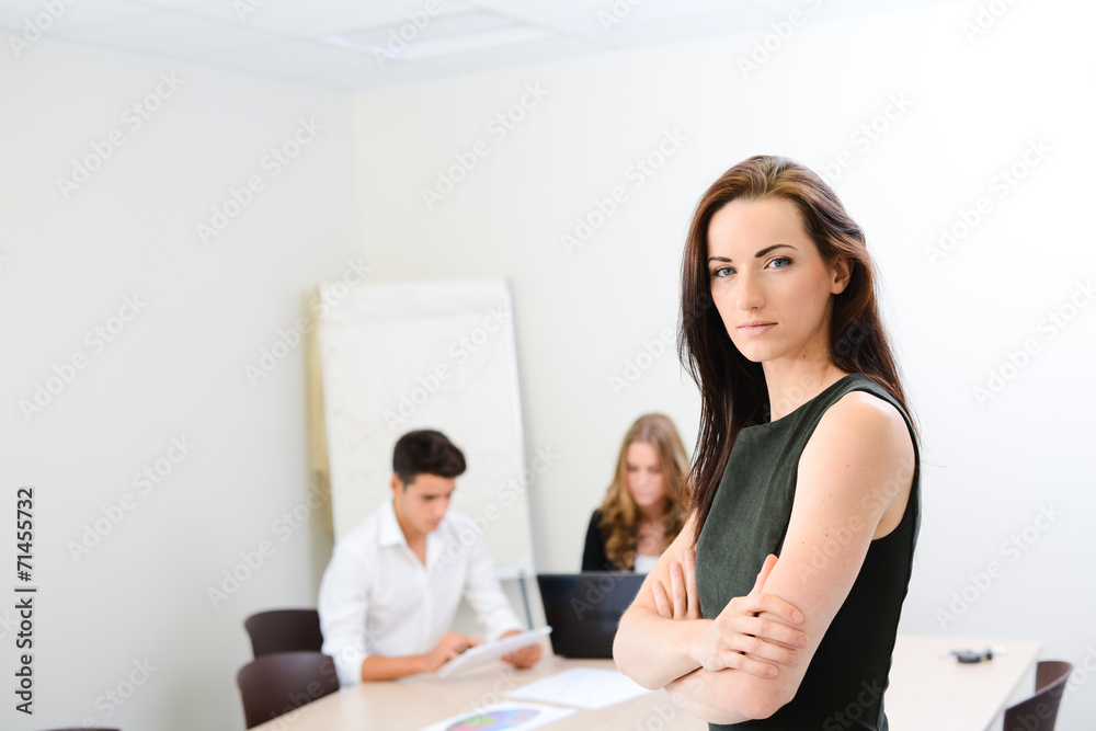 young woman executive manager in meeting room with staff young woman executive manager in meeting room with staff