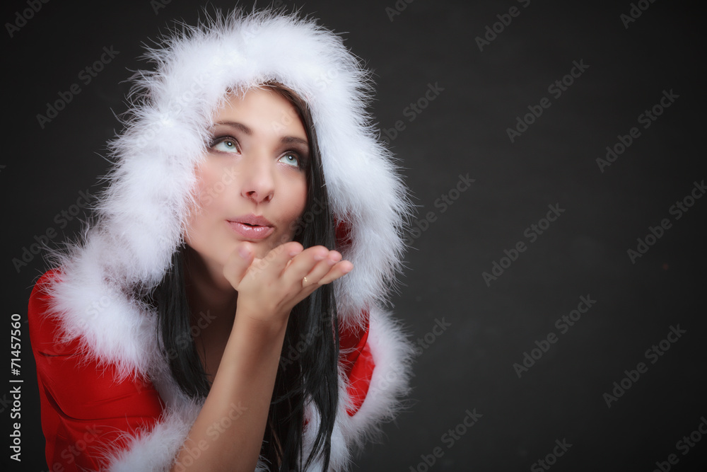 Portrait woman wearing santa clause costume on black Portrait woman wearing santa clause costume on black