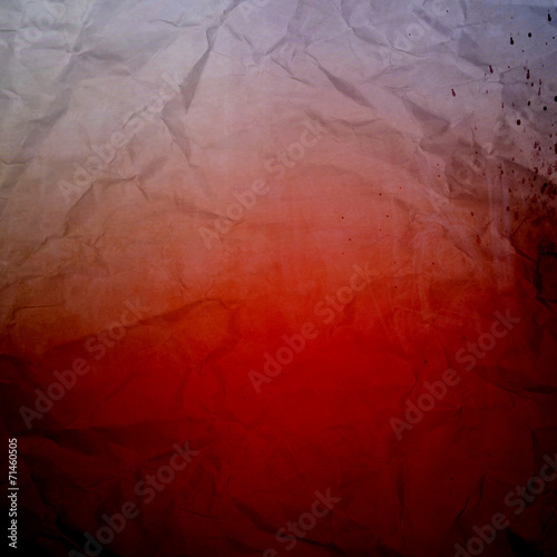 red wrinkled paper texture or background with blood splatters photo