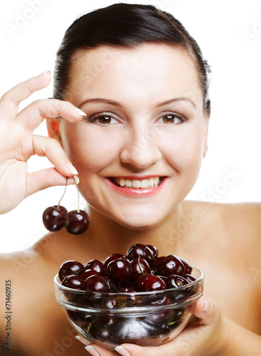 woman with cherries over white photo