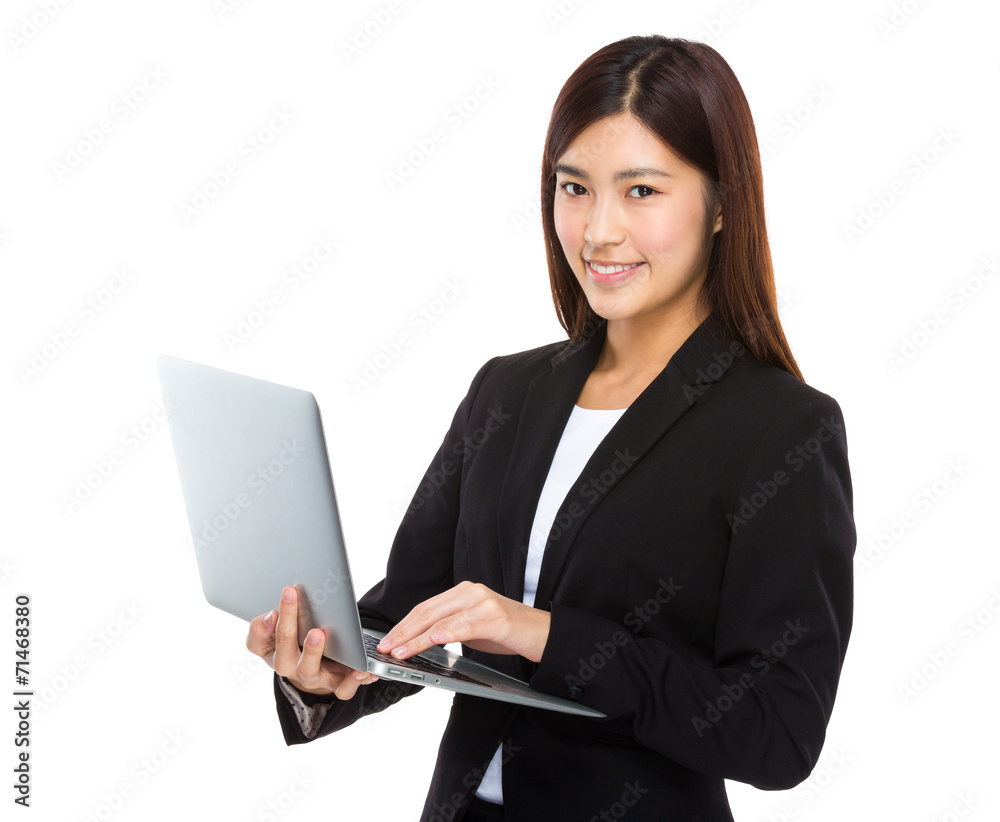 Asian businesswoman use notebook computer Asian businesswoman use notebook computer