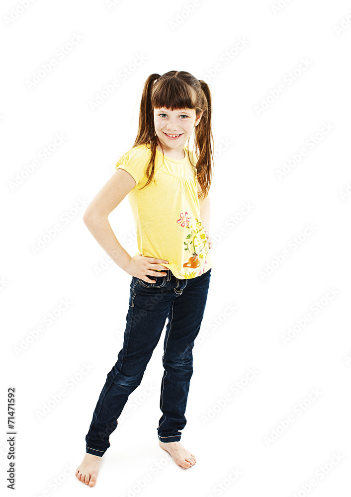 Happy little girl posing on white background
