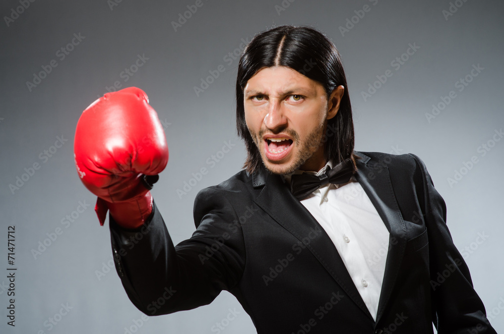 Man businessman with boxing gloves Man businessman with boxing gloves