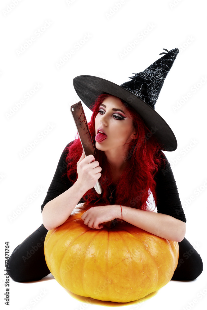 witch with bloodstained hands with a hatchet in hand sits on a p witch with bloodstained hands with a hatchet in hand sits on a p