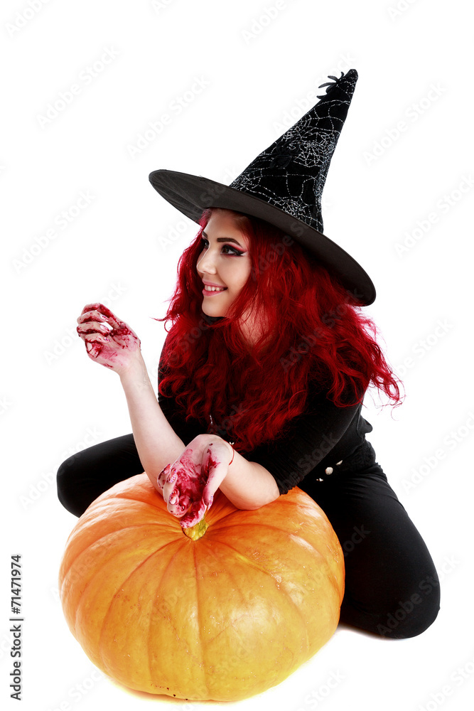 witch with bloodstained hands sits on a pumpkin witch with bloodstained hands sits on a pumpkin