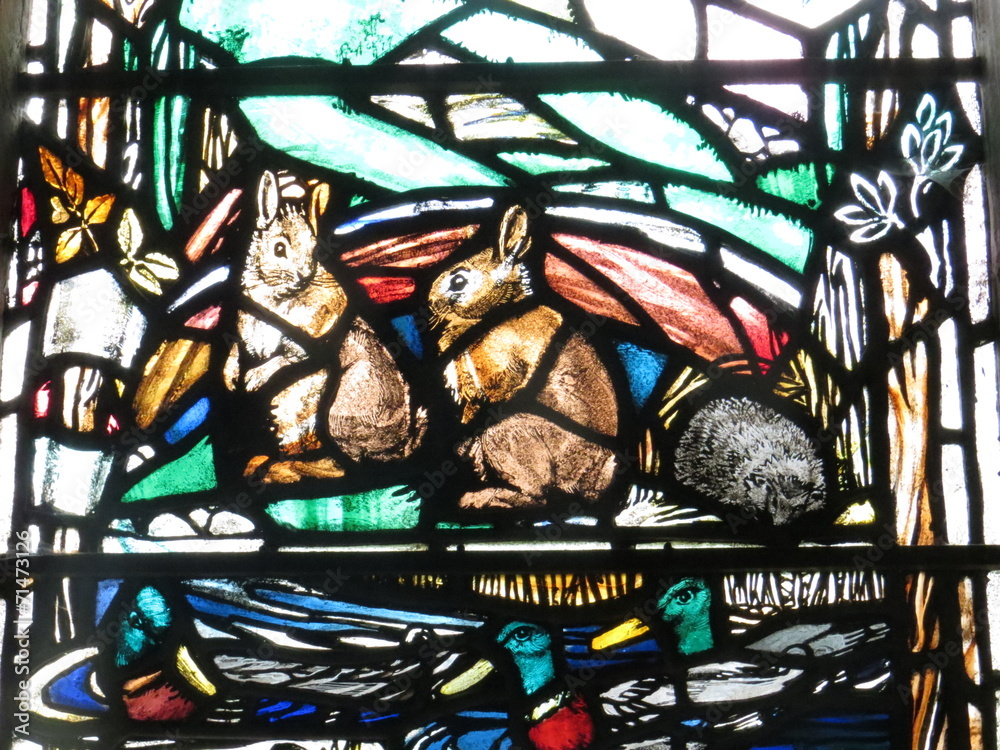 Rabbits and ducks in stained glass