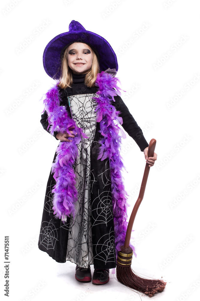 Beautiful cute girl in witch halloween costume hold the broom