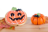 Halloween arrangement with cookie and pumpkins