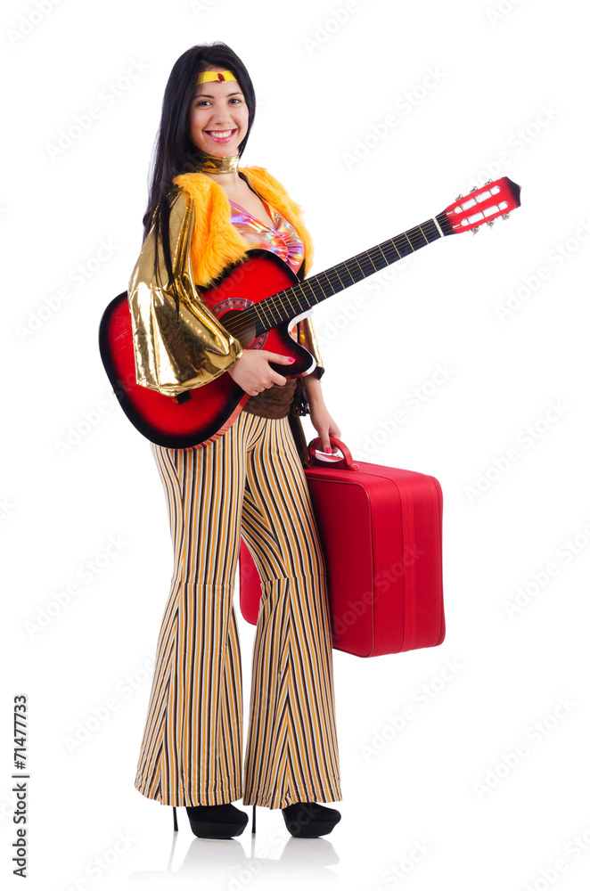 Travelling musician with suitcase and guitar Travelling musician with suitcase and guitar