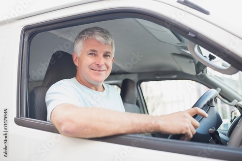 Smiling man driving van © WavebreakMediaMicro