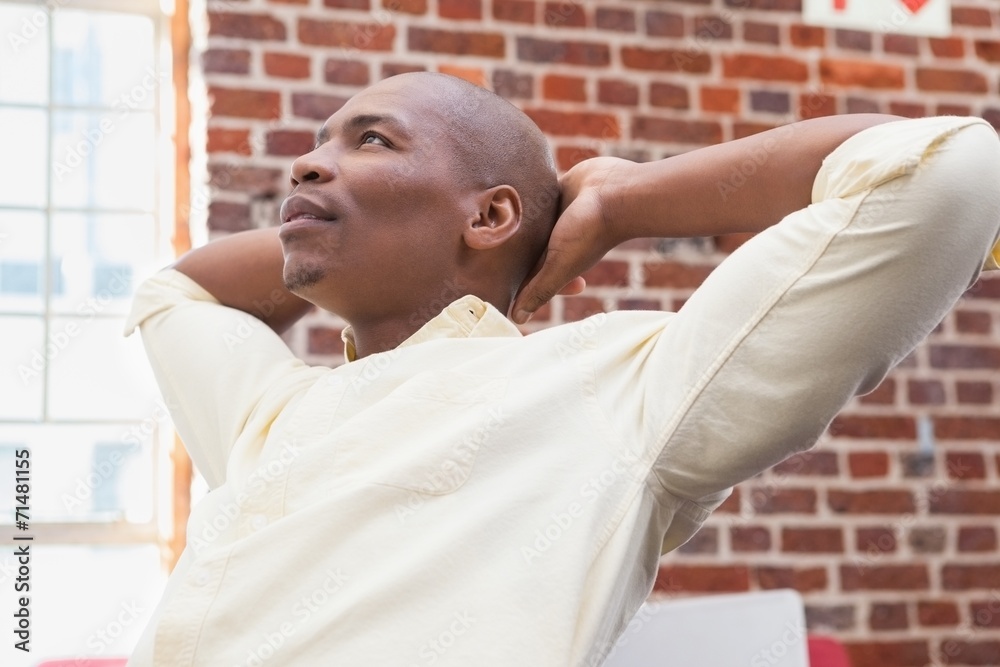 Casual businessman looking up and thinking Casual businessman looking up and thinking