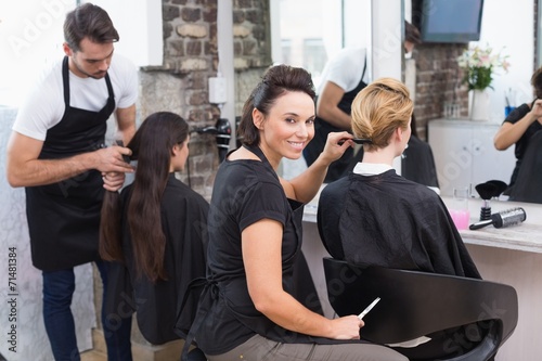 Hairdressers working on their clients