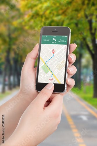 Smartphone with map gps navigation application on the screen