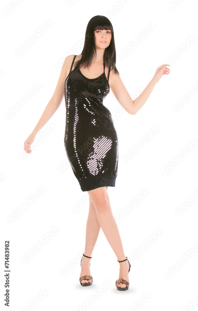 Fashion brunette in black dress posing over white Fashion brunette in black dress posing over white