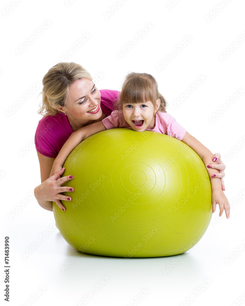 kid and mother with fitness ball kid and mother with fitness ball