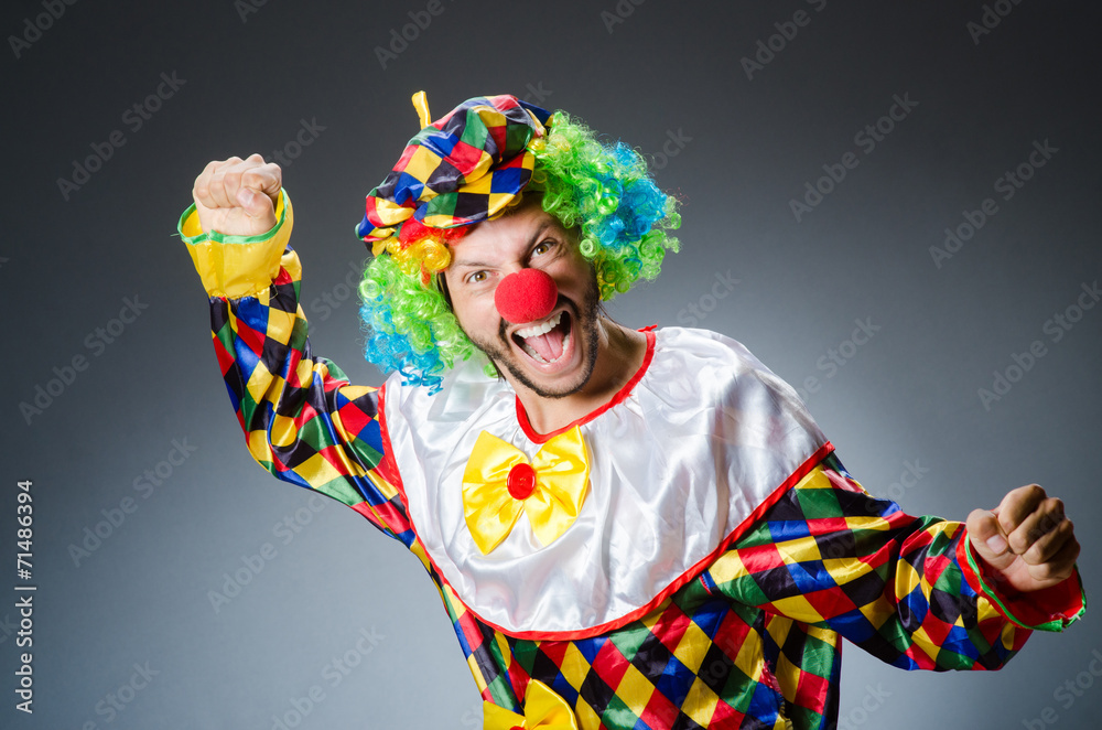 Funny clown in colourful costume Funny clown in colourful costume