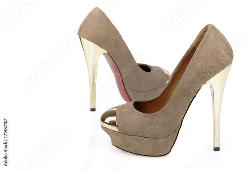 isolated women beige suede shoes