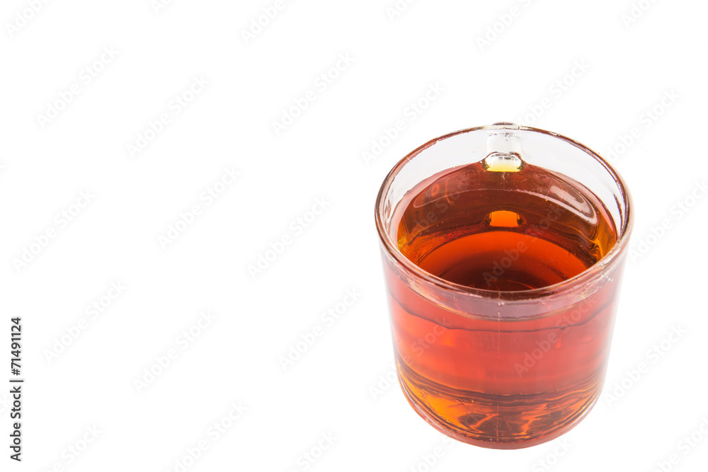 Honey in glass jar over white background Honey in glass jar over white background