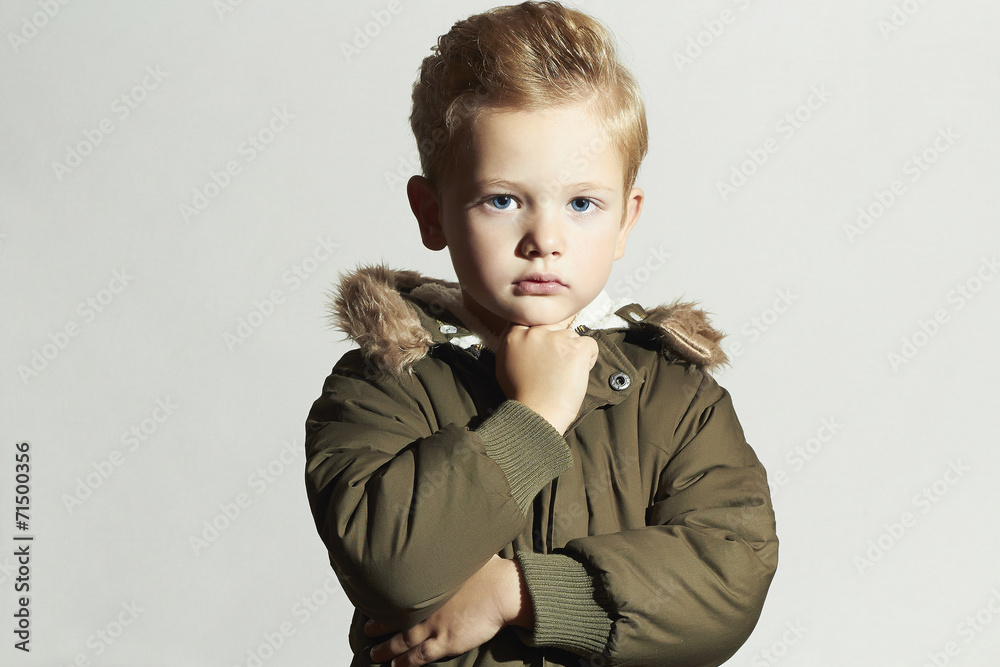 child in winter coat. fashion  boy hairstyle Stock Photo | Adobe  Stock