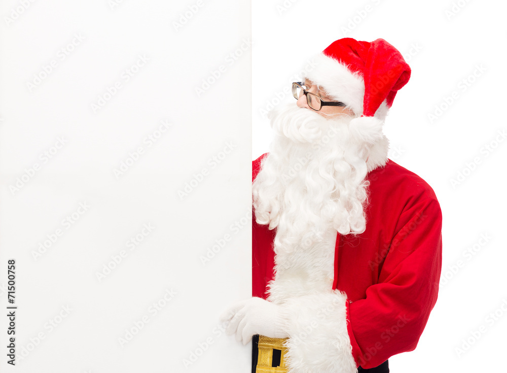 man in costume of santa claus with billboard man in costume of santa claus with billboard